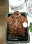 Yes, that is a bacon-wrapped turkey.